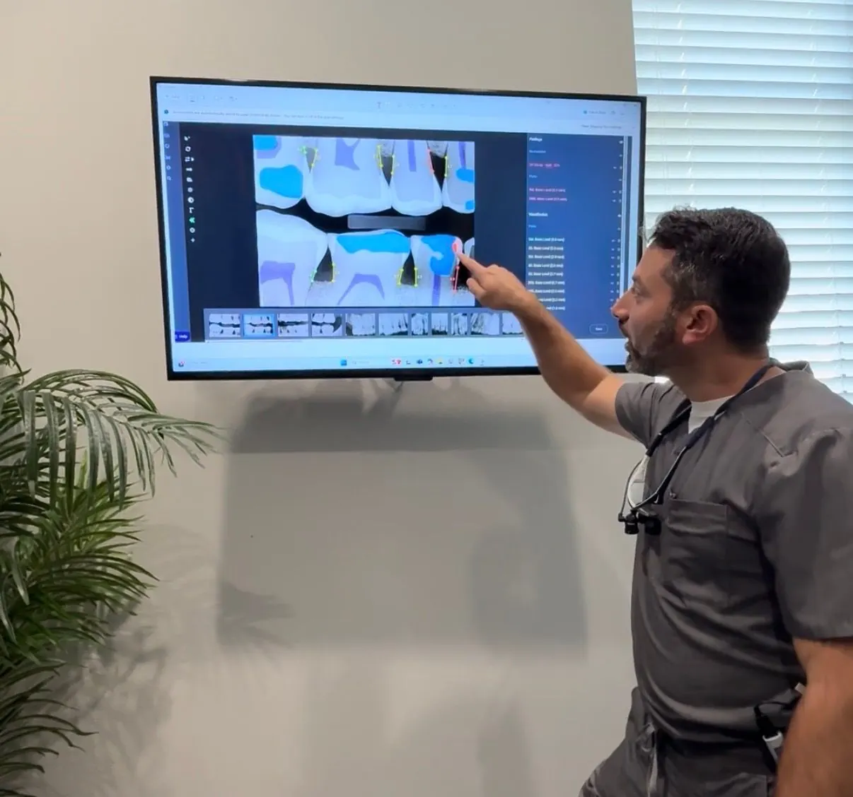 Dr. Noah Honig walking through AI-assisted x-ray findings on the treatment room screen