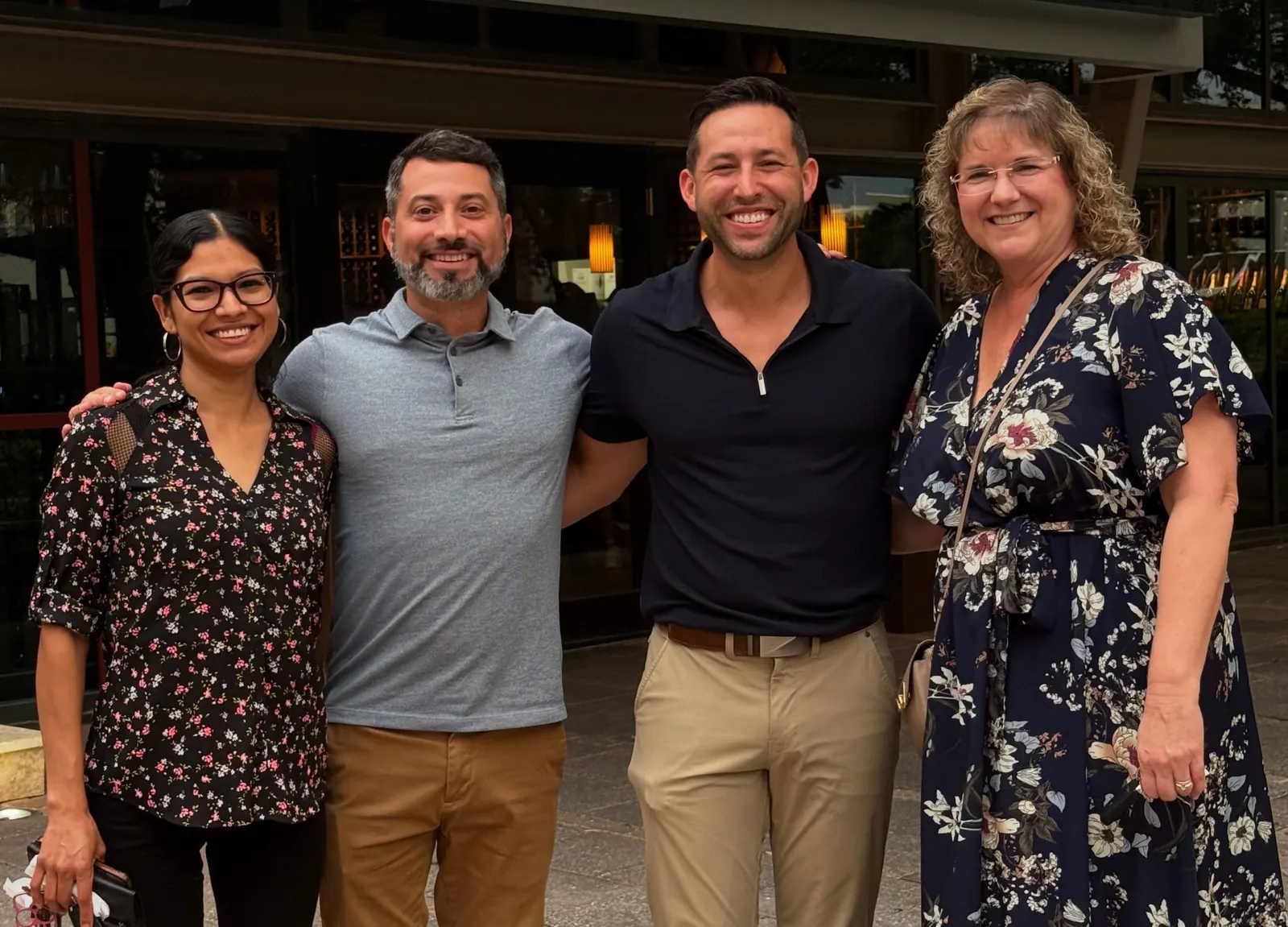 Dr. Noah Honig and Dr. Brandon Wolf with Staff 1 and Staff 2 at a team evening out