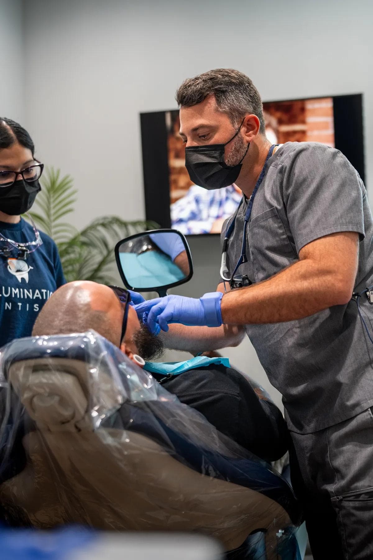 Dr. Honig treating a patient at Illumination Dentistry in Lutz, FL
