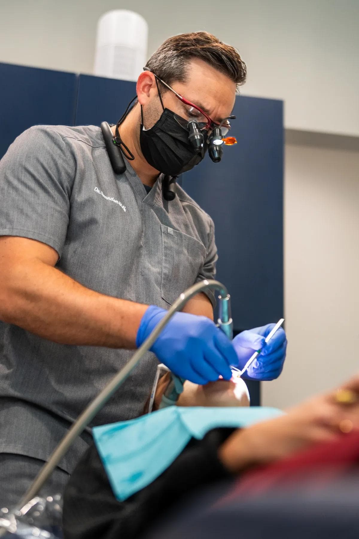 Dr. Wolf treating a patient at Illumination Dentistry in Lutz, FL